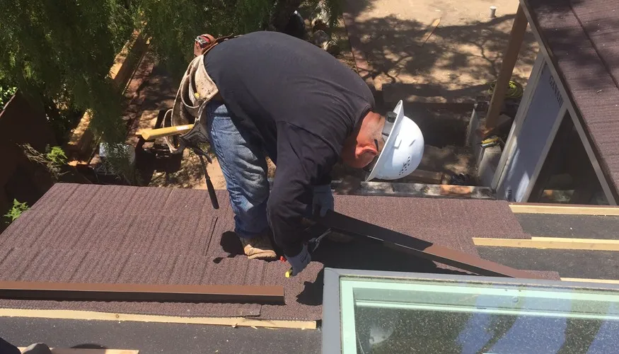 Roofing professionals discussing Tefute USA stone-coated steel roofing solutions