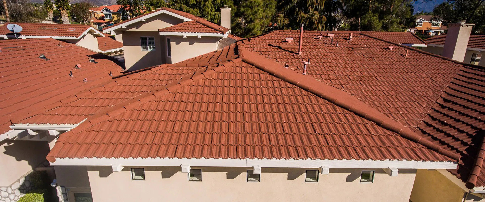 Tefute USA's Scarlett red roofing tiles, showcasing the textured finish of the Classical Profile